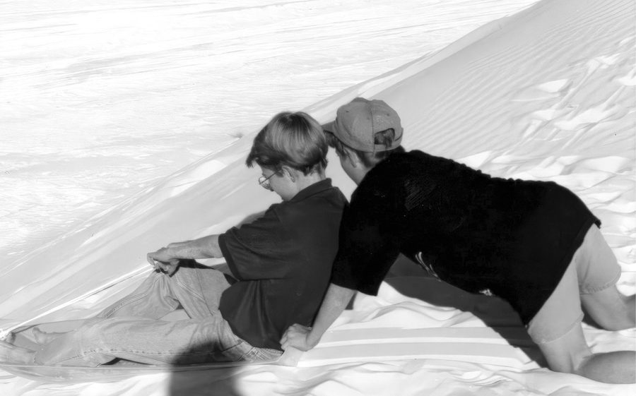 Brandon and I carving paths down the gypsum dunes at White Sands National Park.