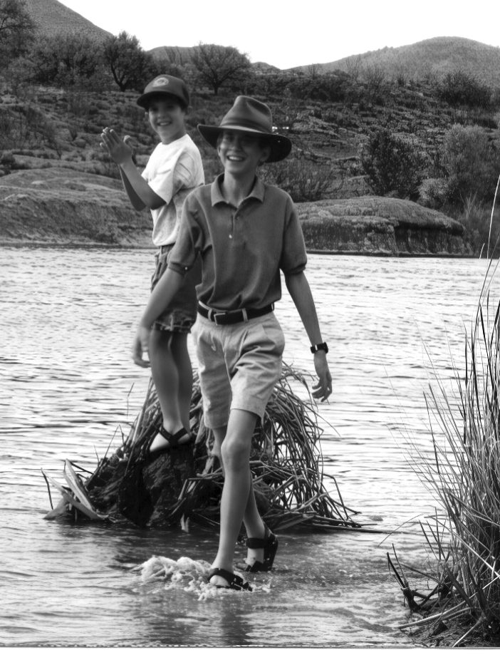 Goofy grins on our faces after dropping our bag of fish guts.